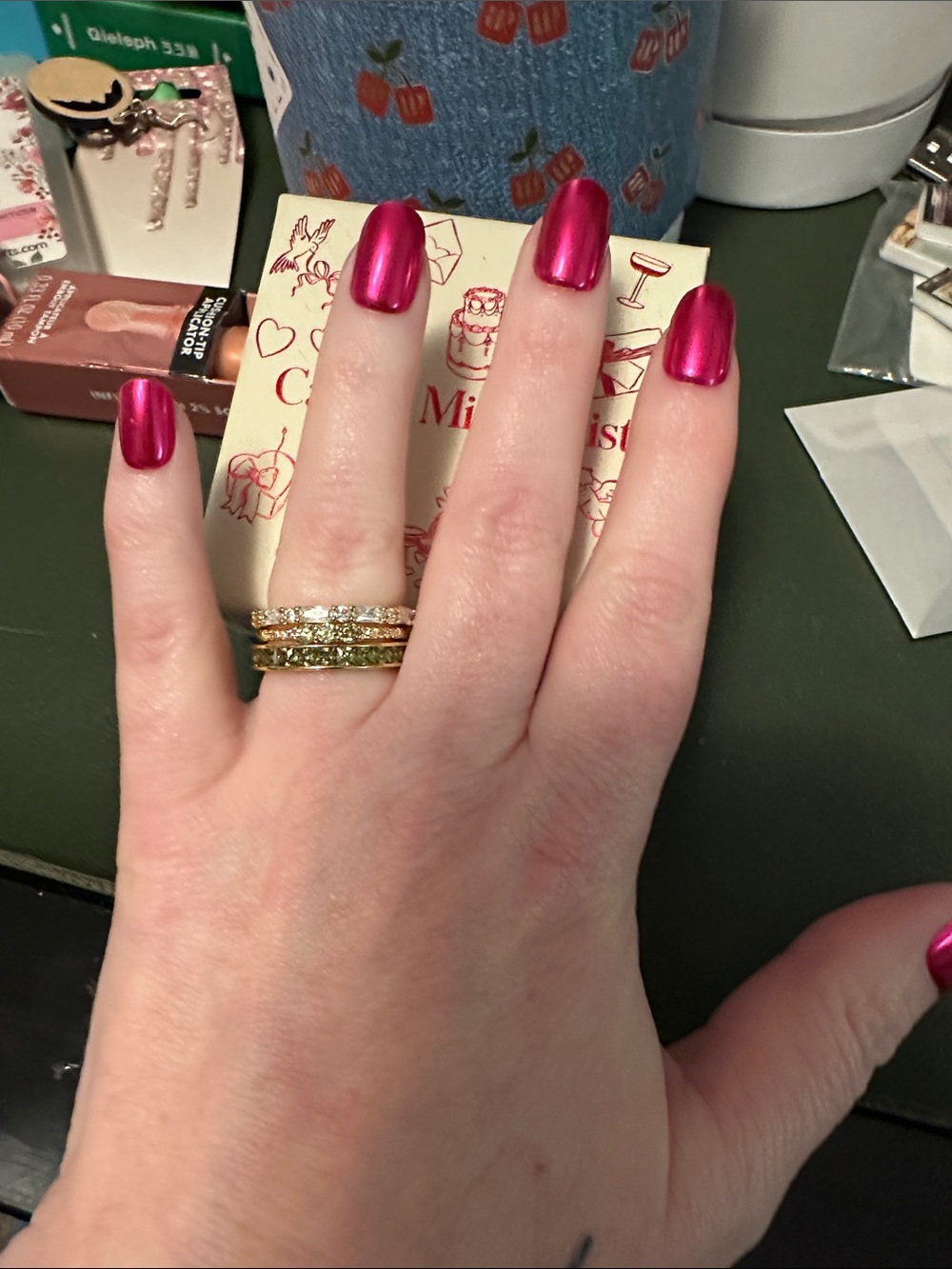 Rings x 3 size 7 gold with green stones